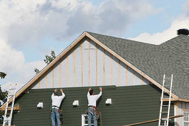 Professional Siding Installation technician working in West Finley, PA